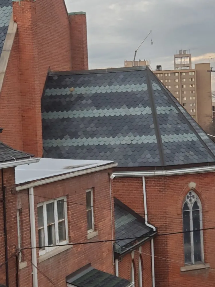 Slide of Magnes Roofing