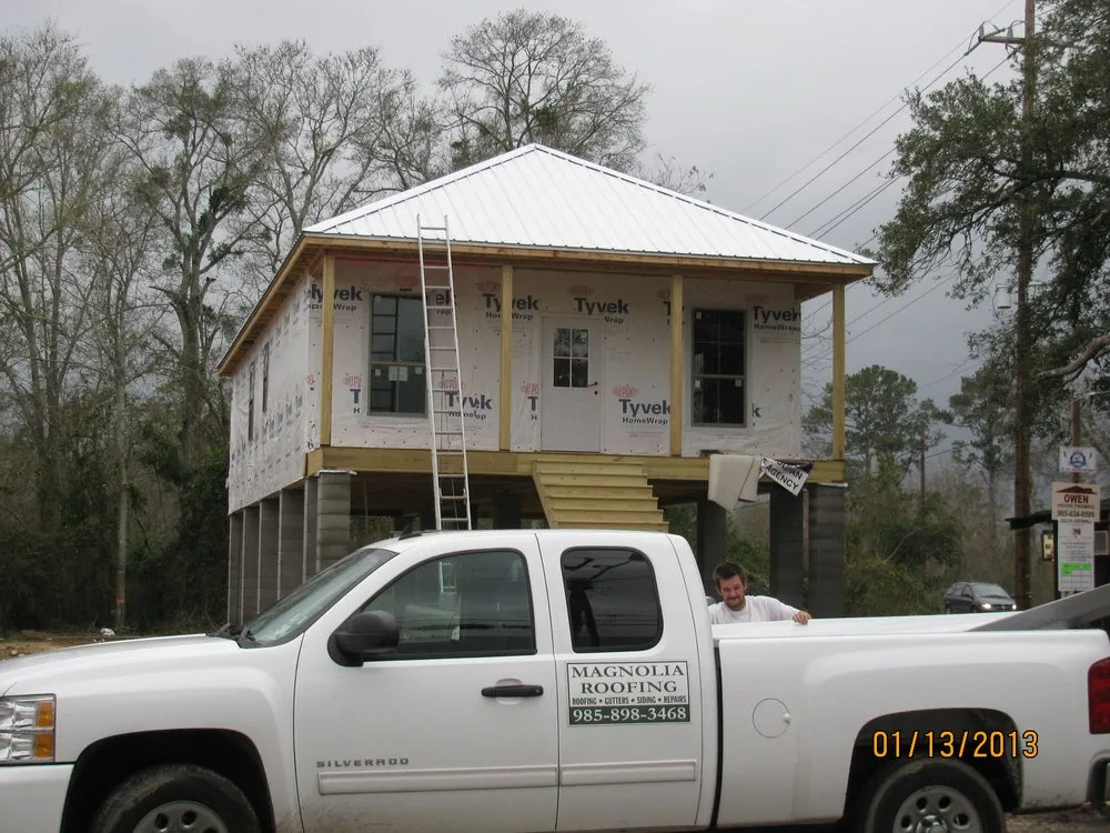 Slide of Magnolia Roofing