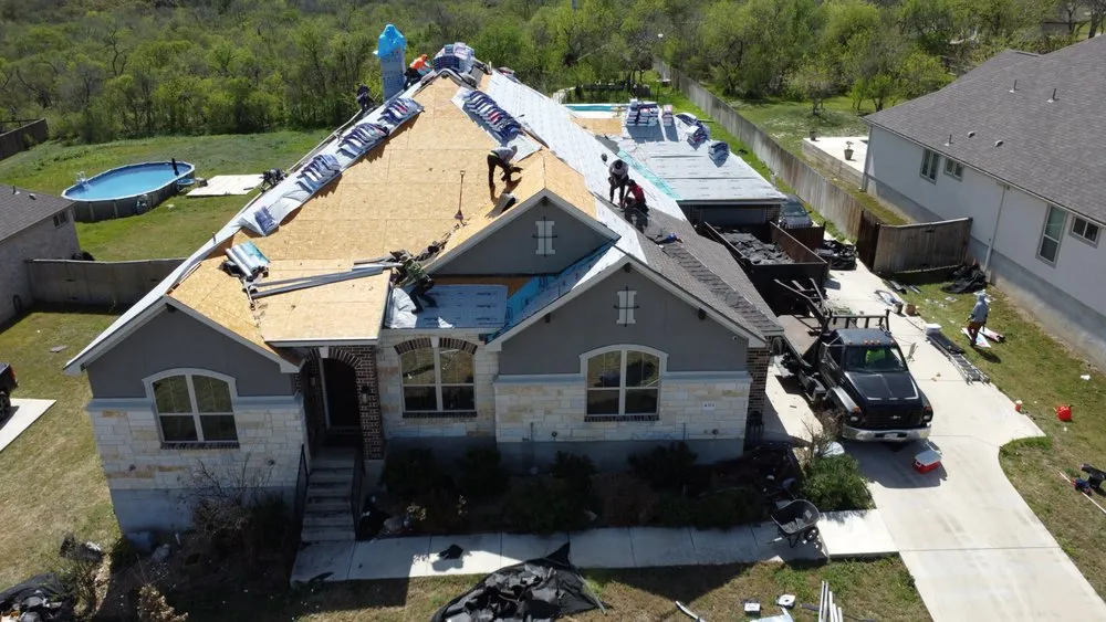Slide of Magnum Roofing & Restoration