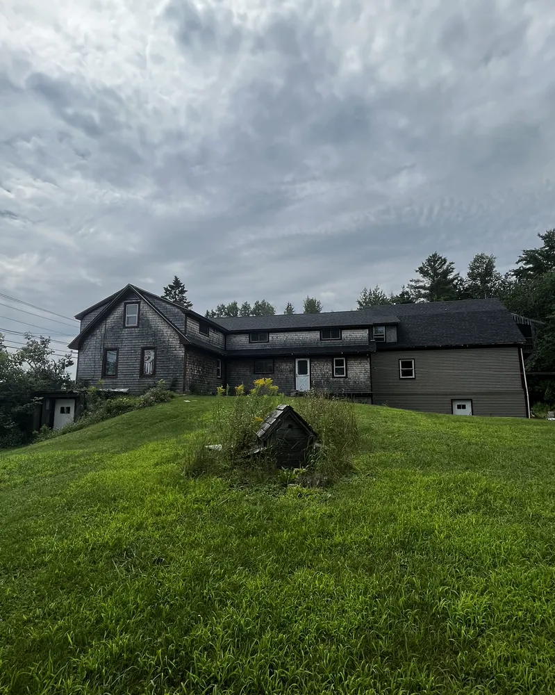 Slide of Maine Coast Roofing