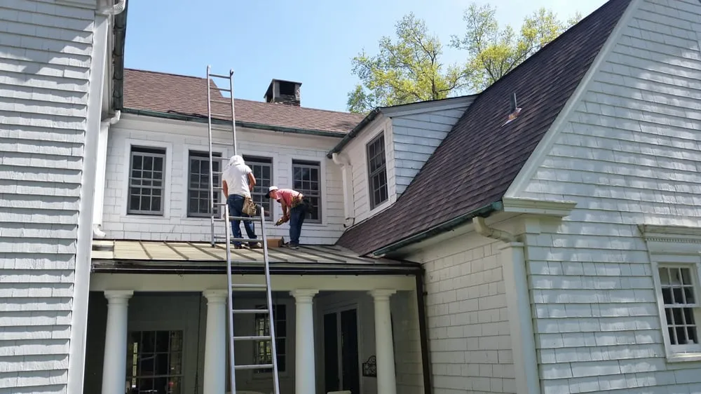 Slide of Maine Touch Roofing