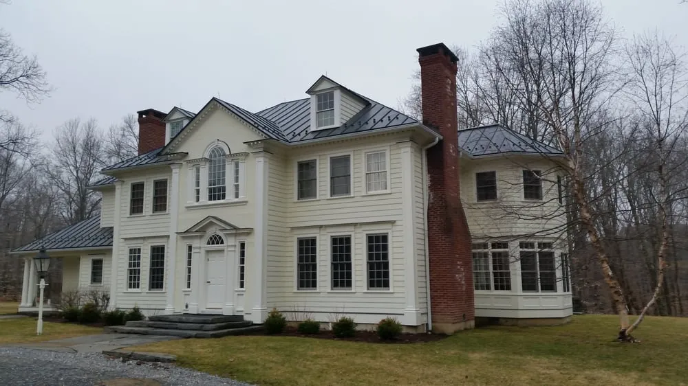 Slide of Maine Touch Roofing