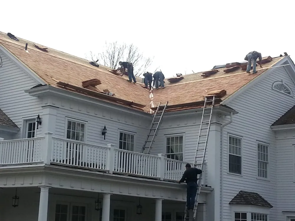 Slide of Maine Touch Roofing