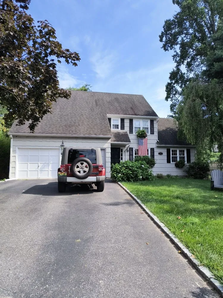 Slide of Maine Touch Roofing