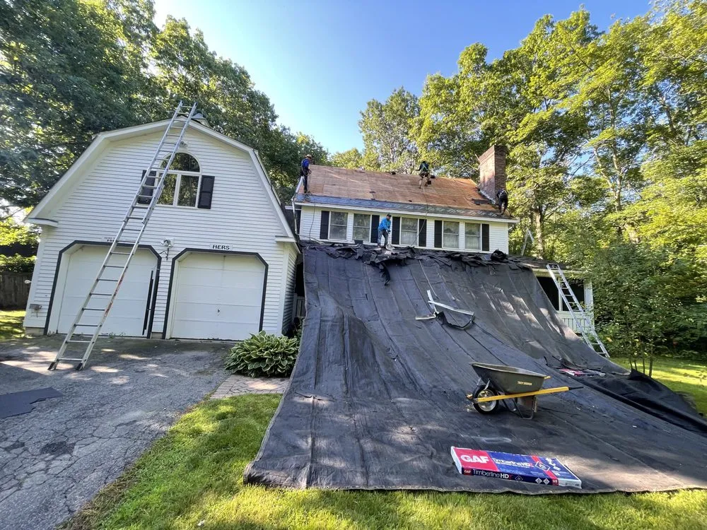 Slide of Mairink roofing experts