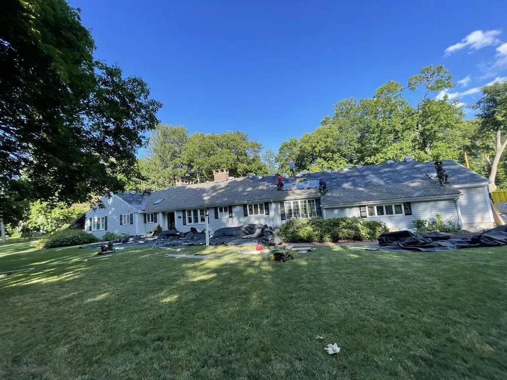 Slide of Mairink roofing experts