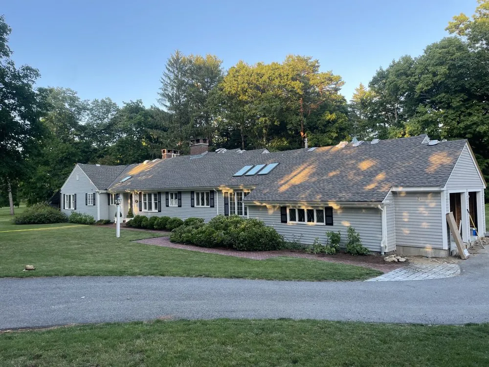 Slide of Mairink roofing experts