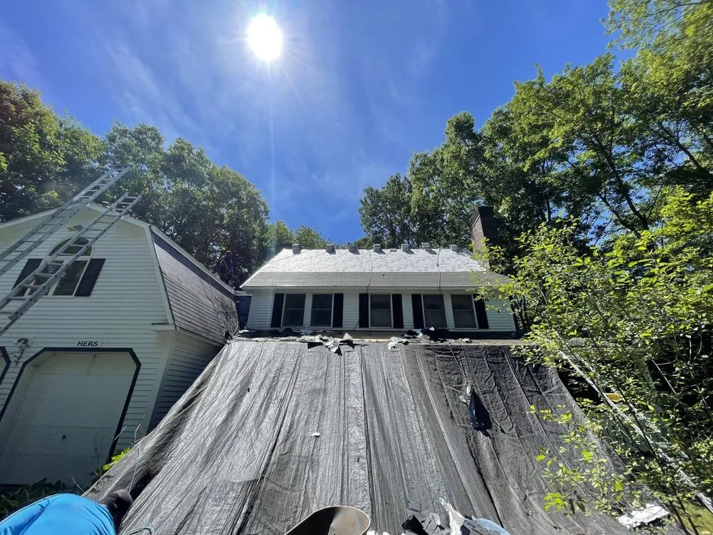 Slide of Mairink roofing experts