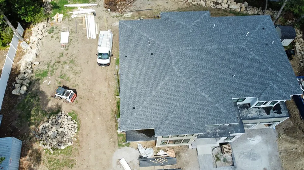 Slide of Mairink roofing experts