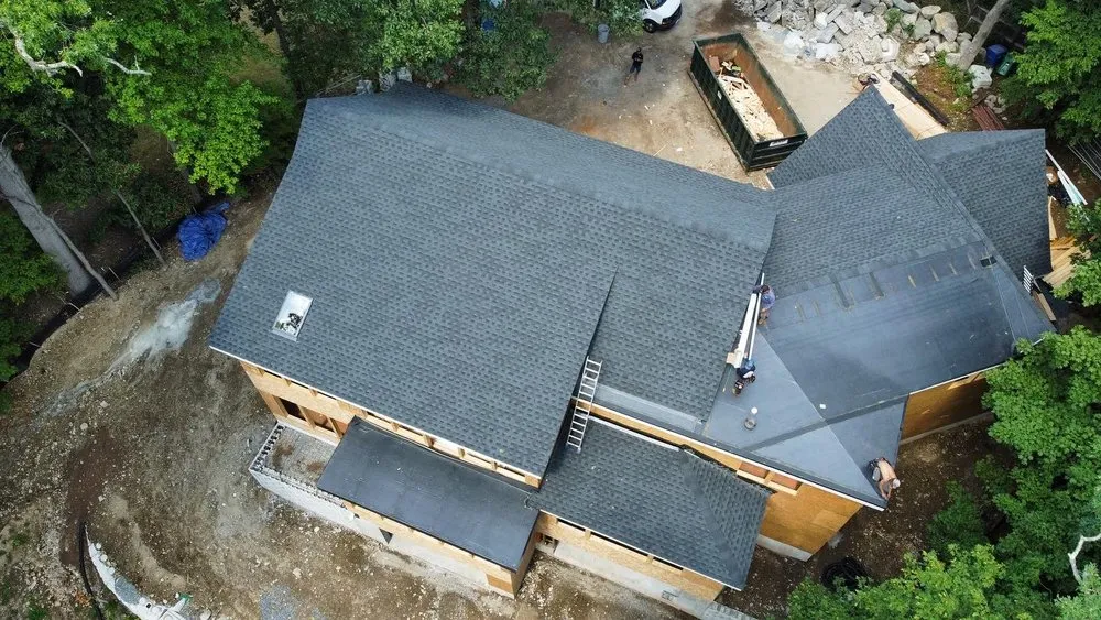 Slide of Mairink roofing experts