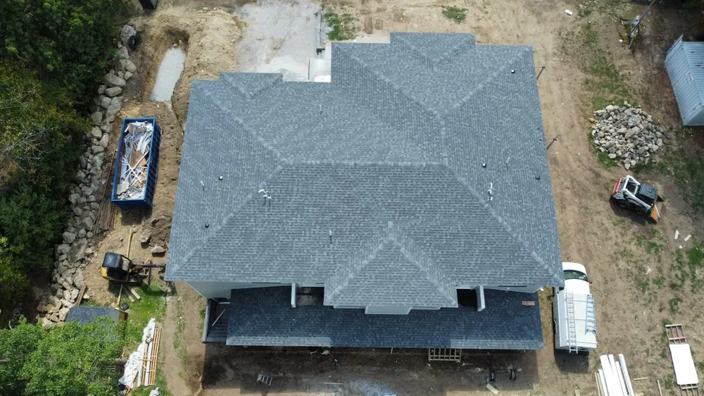 Slide of Mairink roofing experts