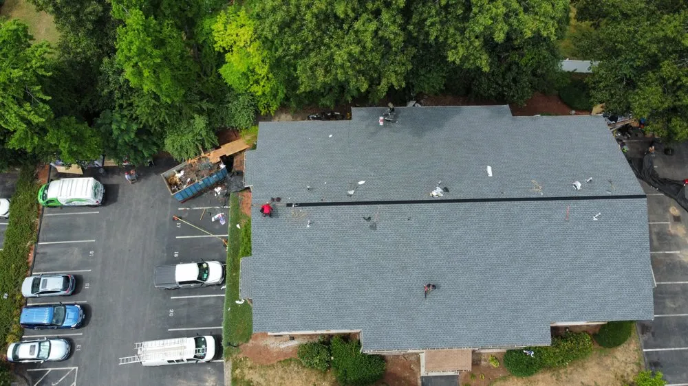 Slide of Mairink roofing experts