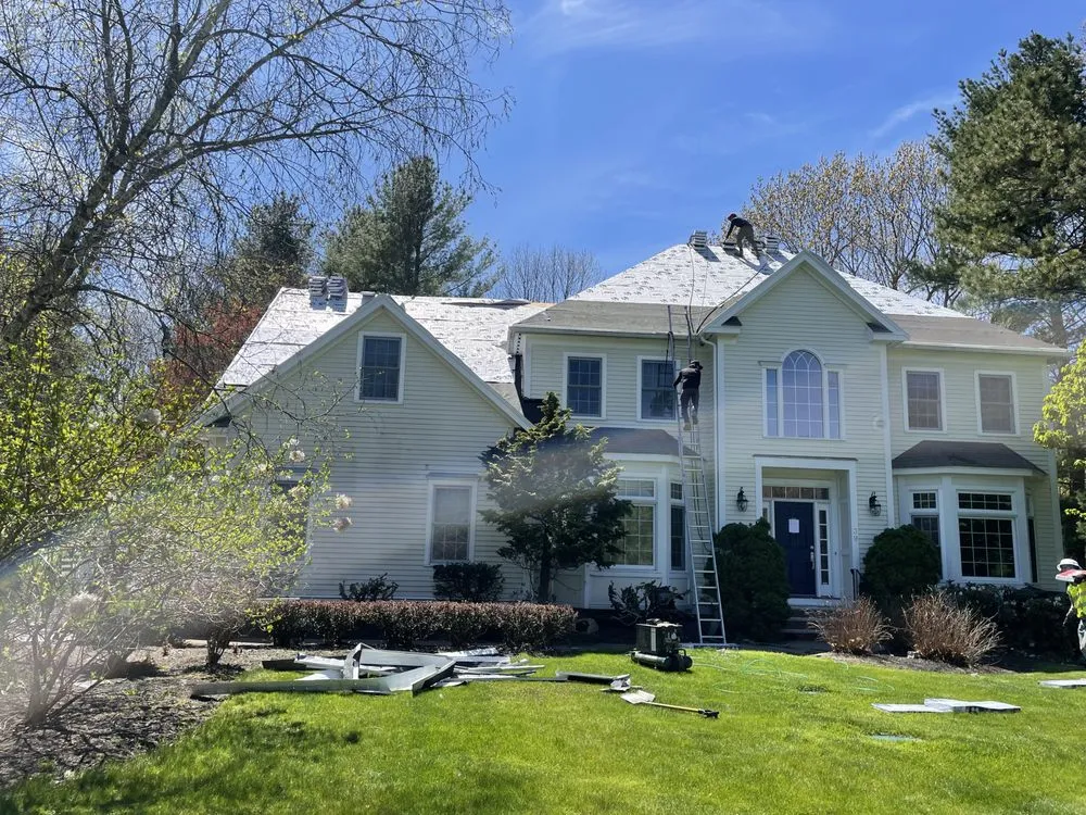 Slide of Mairink roofing experts