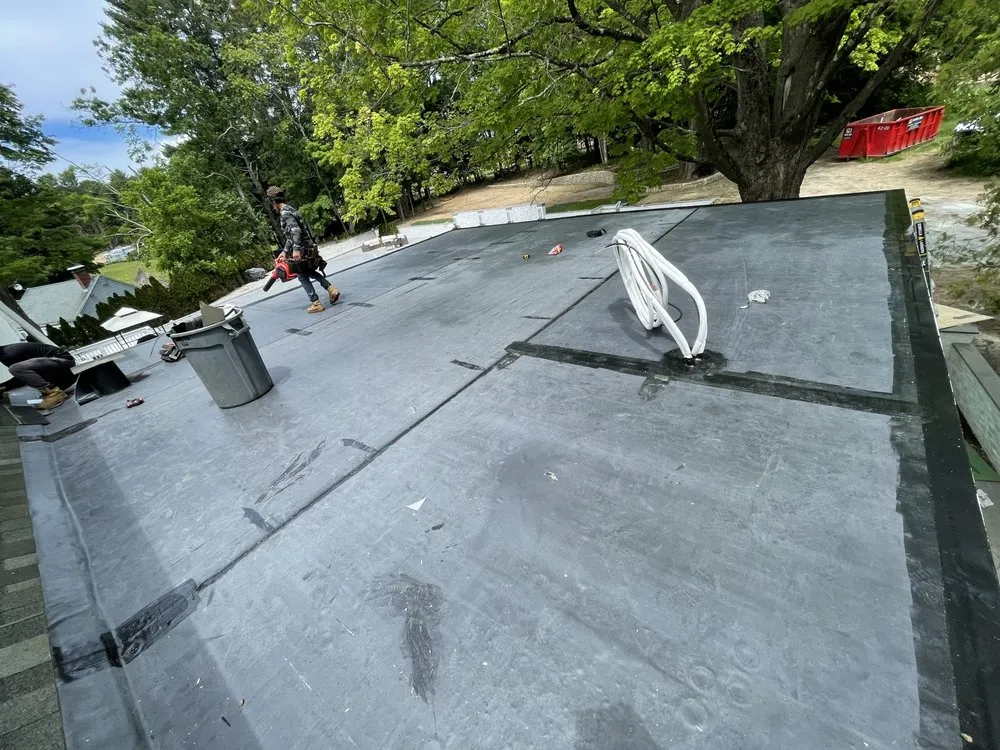 Slide of Mairink roofing experts