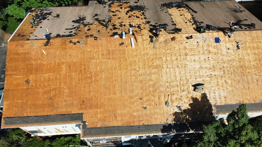 Slide of Mairink roofing experts