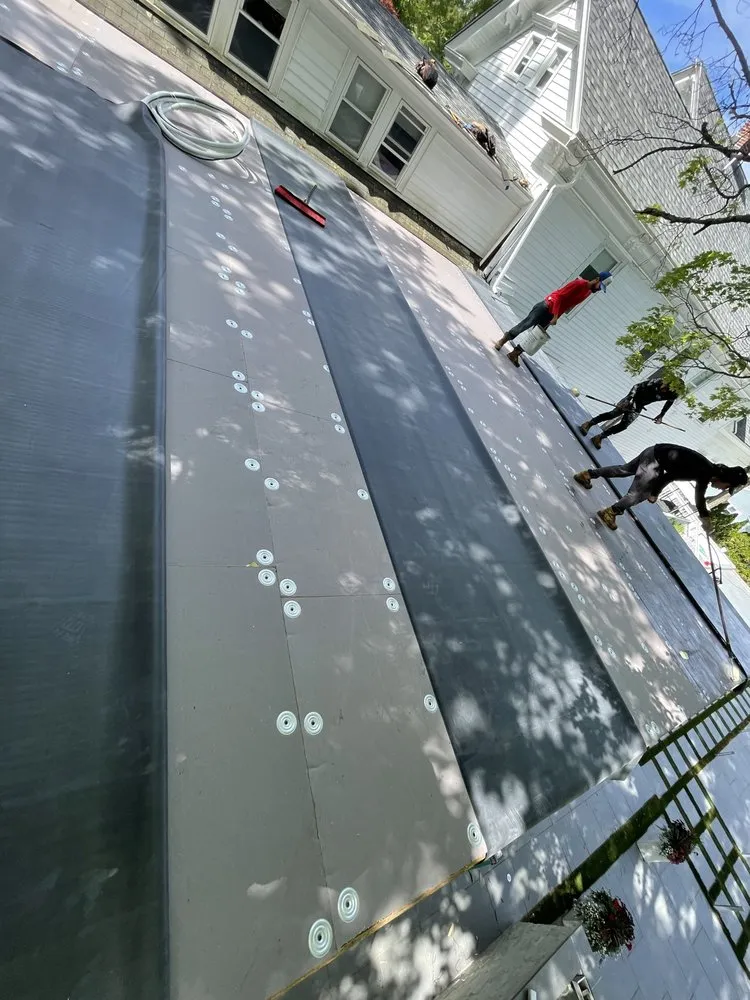 Slide of Mairink roofing experts