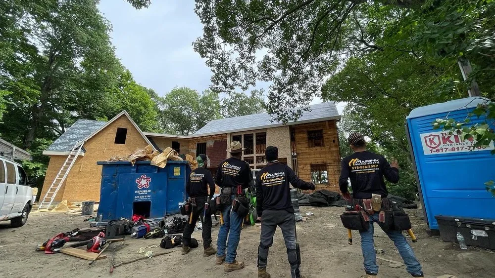 Slide of Mairink roofing experts