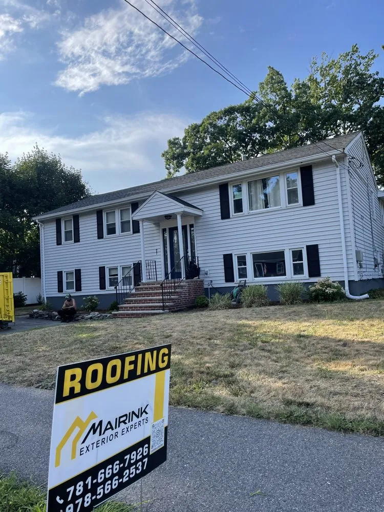 Slide of Mairink roofing experts