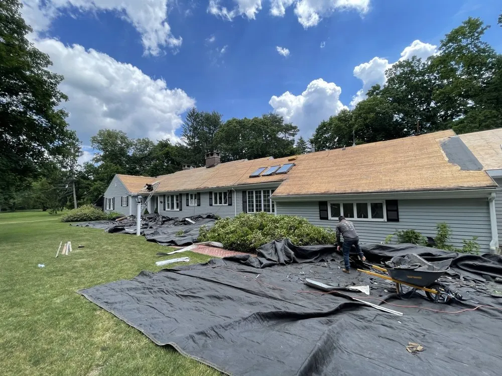 Slide of Mairink roofing experts