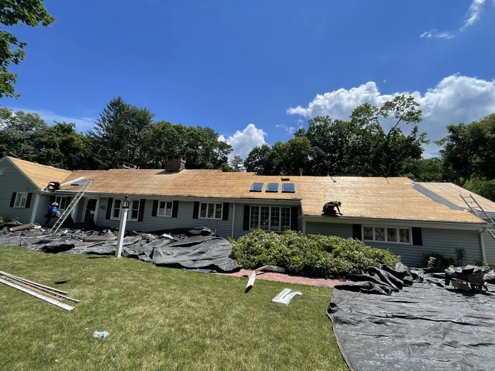 Slide of Mairink roofing experts