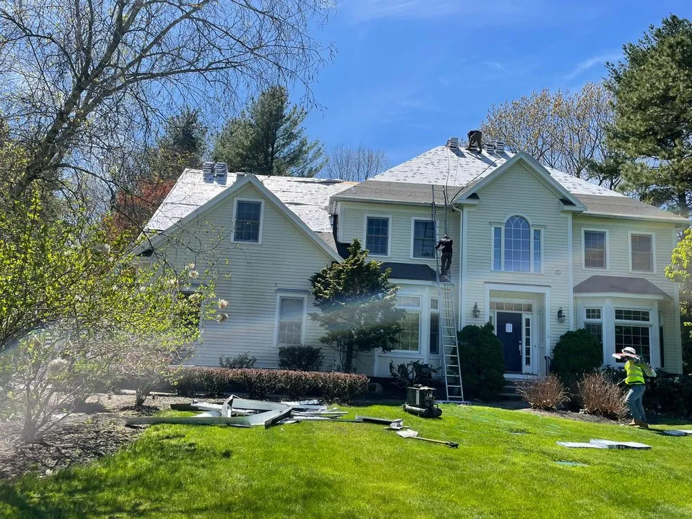 Slide of Mairink roofing experts