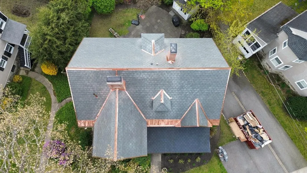 Slide of Mairink roofing experts