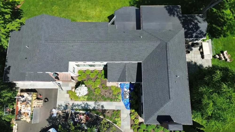 Slide of Mairink roofing experts