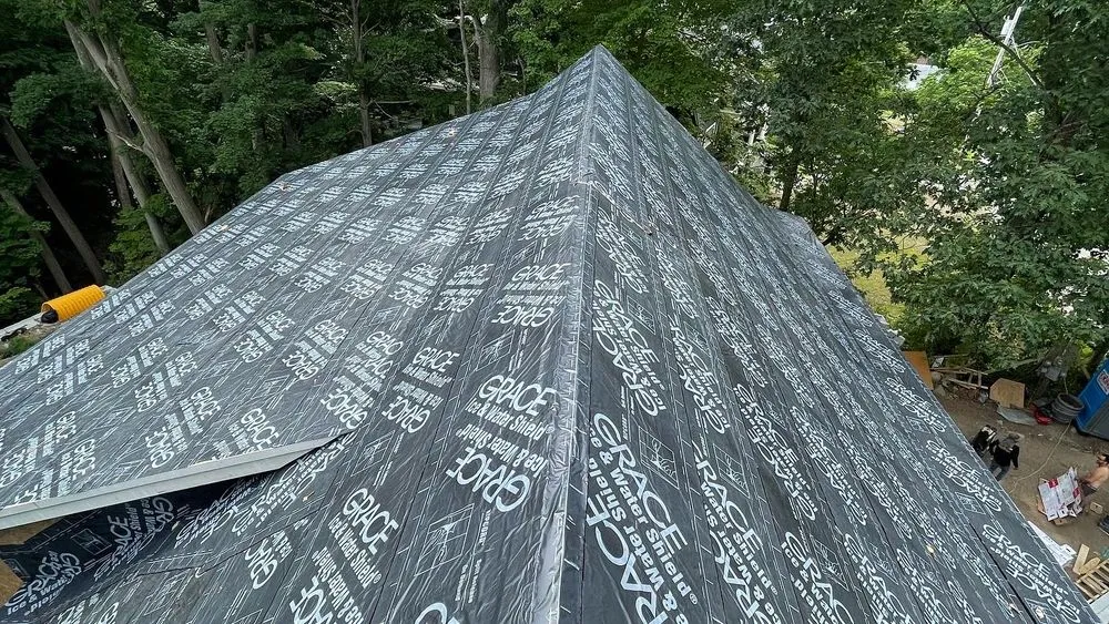 Slide of Mairink roofing experts