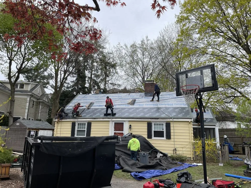 Slide of Mairink roofing experts