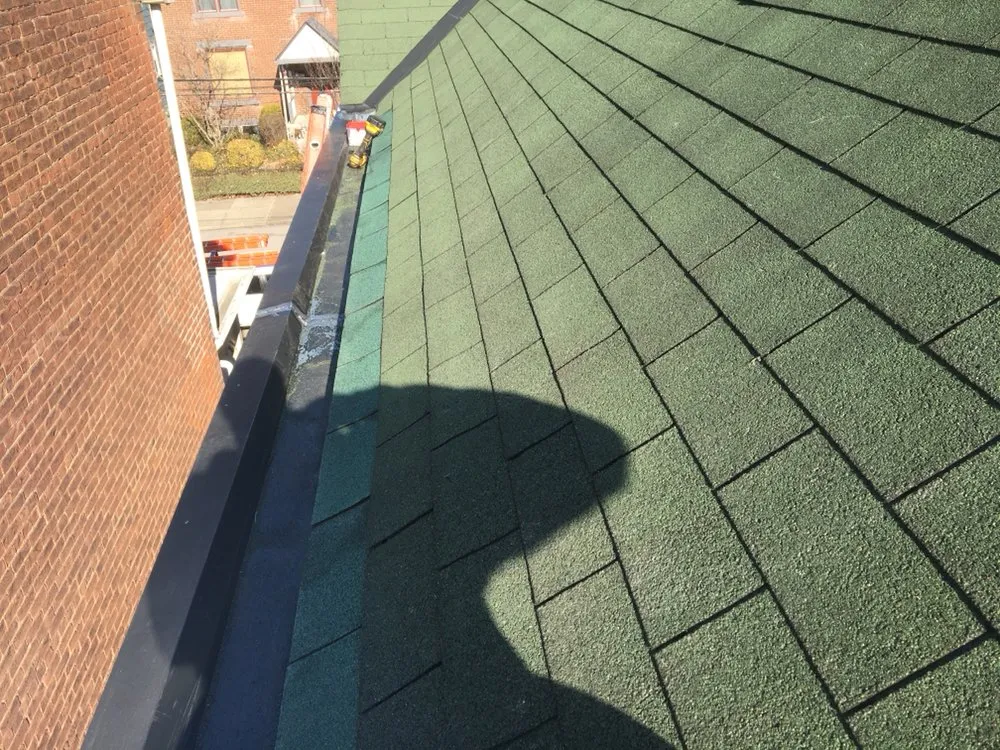 Slide of Maksim Roofing