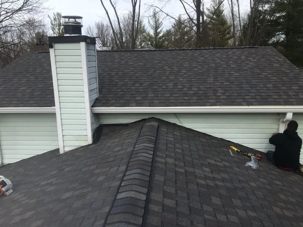 Slide of Maksim Roofing