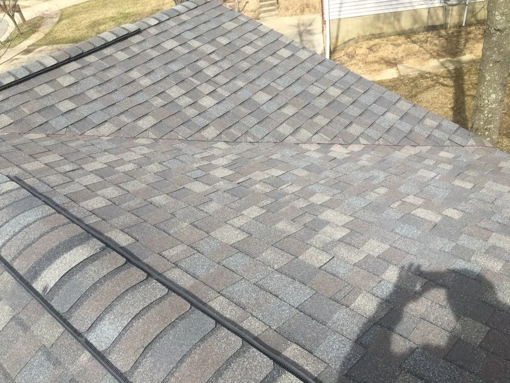 Slide of Maksim Roofing