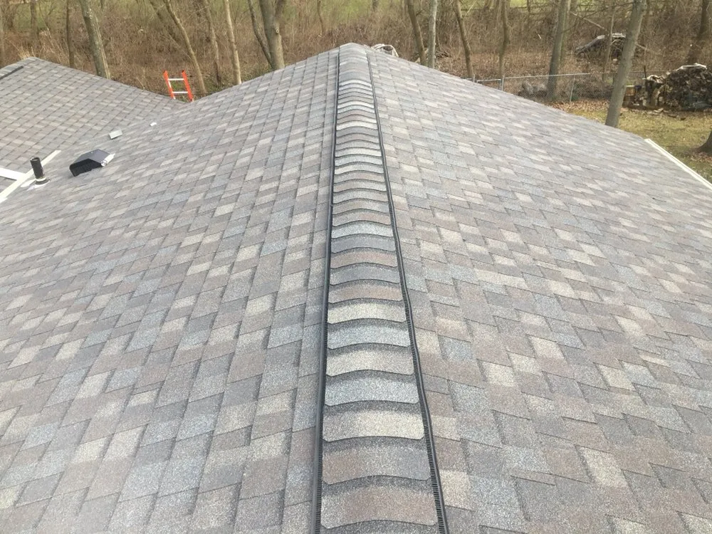 Slide of Maksim Roofing