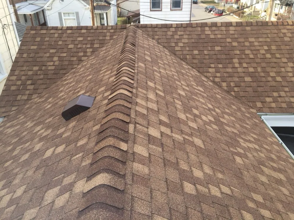 Slide of Maksim Roofing