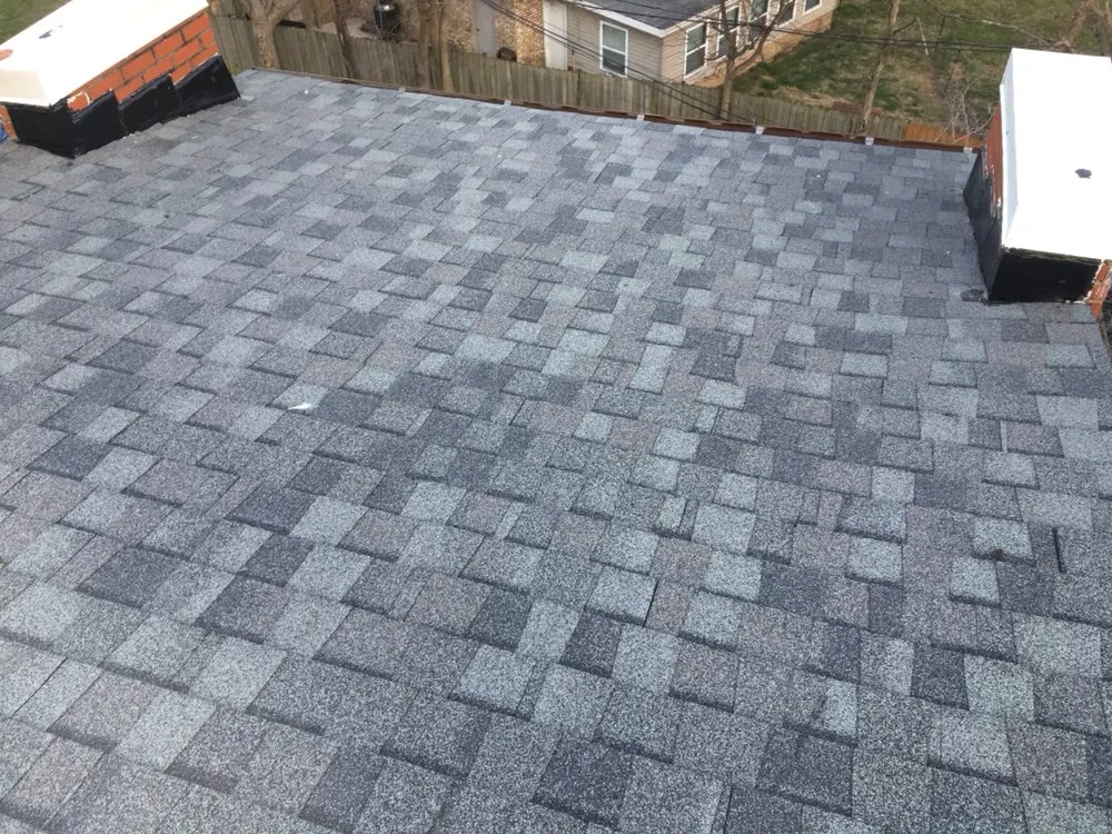 Slide of Maksim Roofing