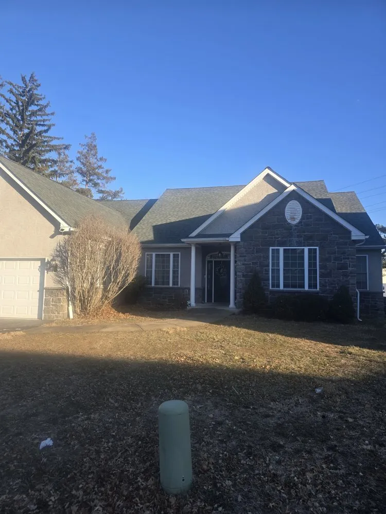 Slide of Malanda Exteriors | Roofing and Siding Company