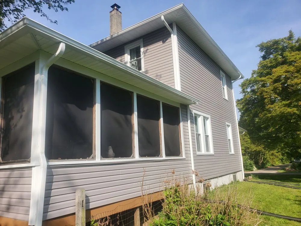 Slide of Malanda Exteriors | Roofing and Siding Company