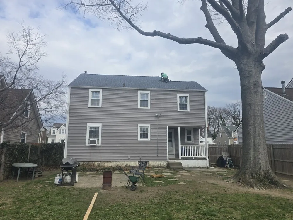 Slide of Malanda Exteriors | Roofing and Siding Company