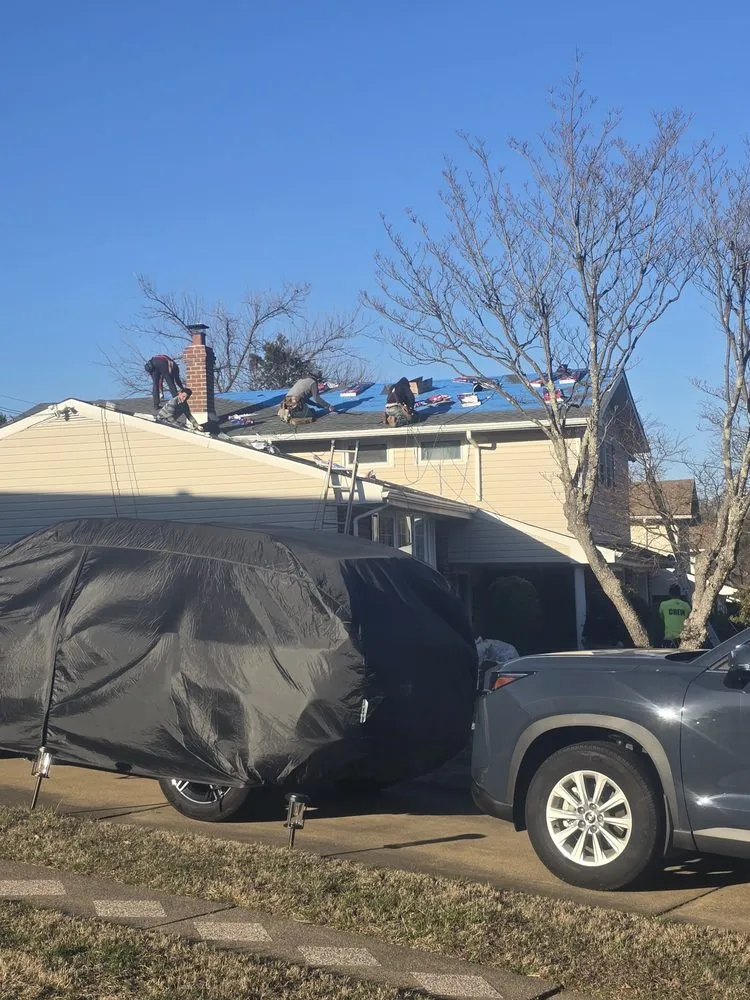 Slide of Malanda Exteriors | Roofing and Siding Company