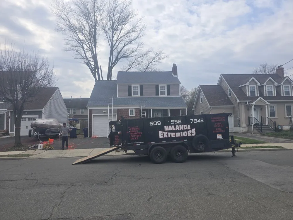 Slide of Malanda Exteriors | Roofing and Siding Company