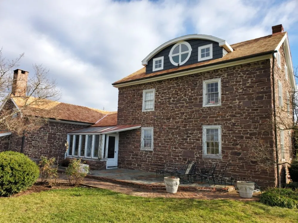 Slide of Malanda Exteriors | Roofing and Siding Company