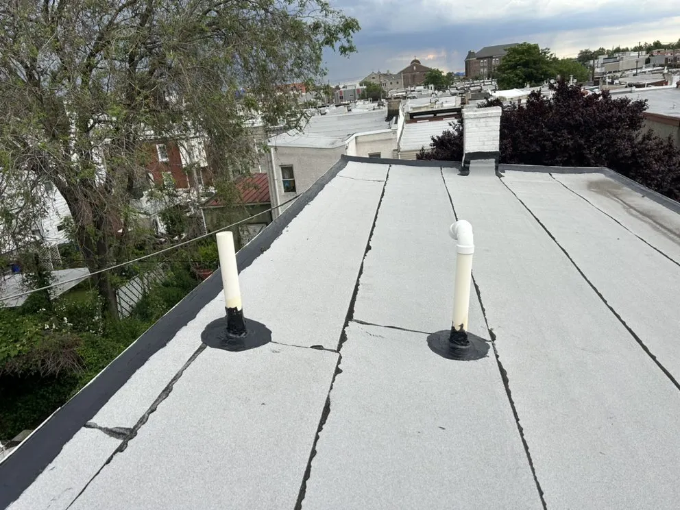 Slide of Malcolm Bros Roofing & Construction