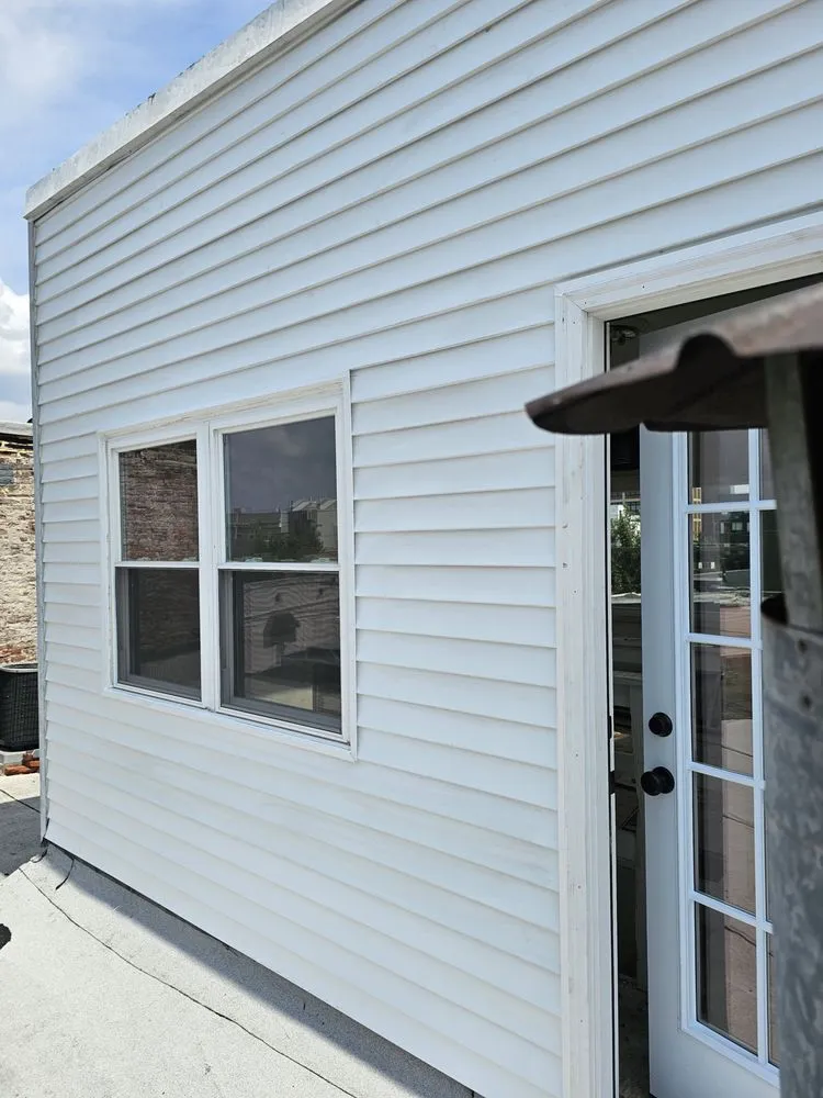 Slide of Malcolm Bros Roofing & Construction