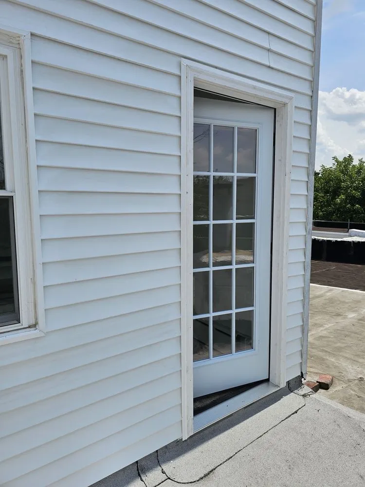 Slide of Malcolm Bros Roofing & Construction