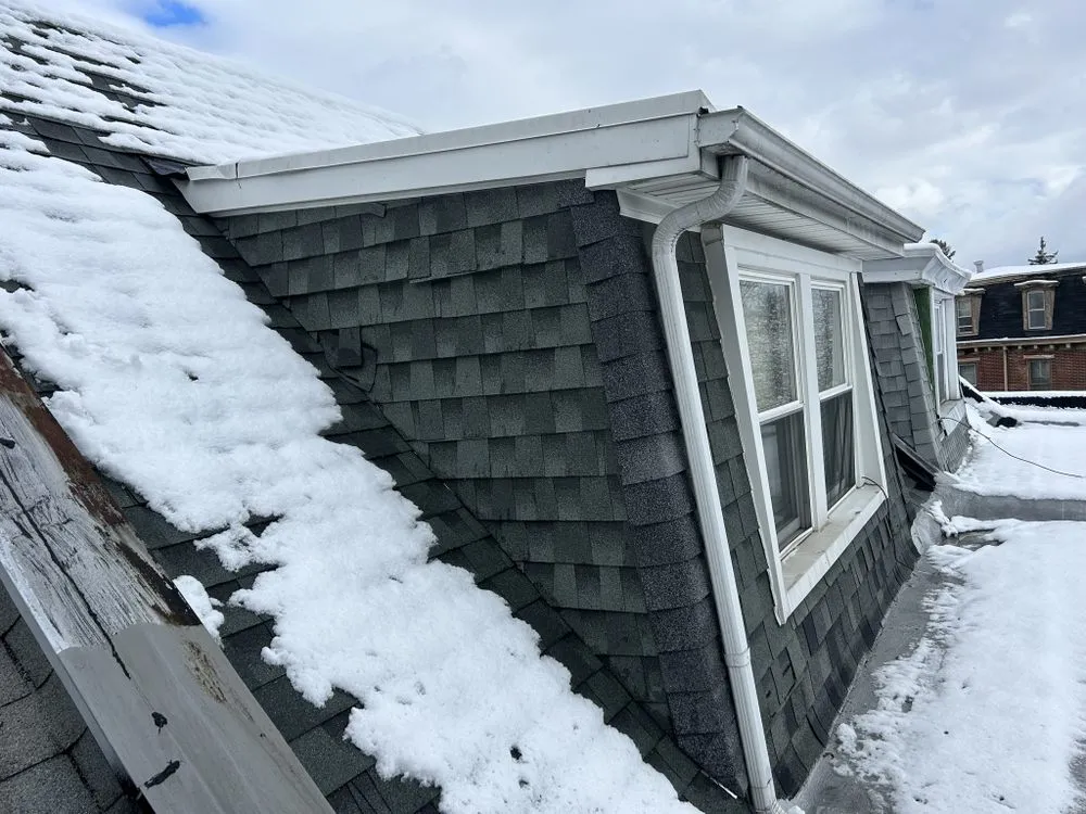 Slide of Malcolm Bros Roofing & Construction