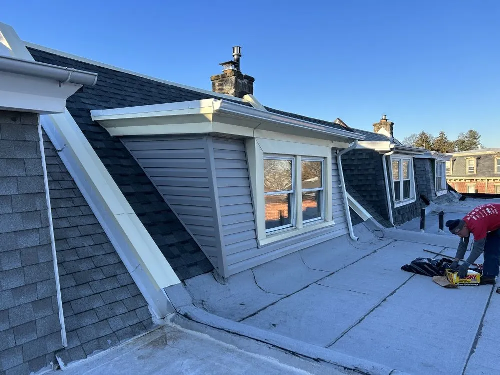 Slide of Malcolm Bros Roofing & Construction