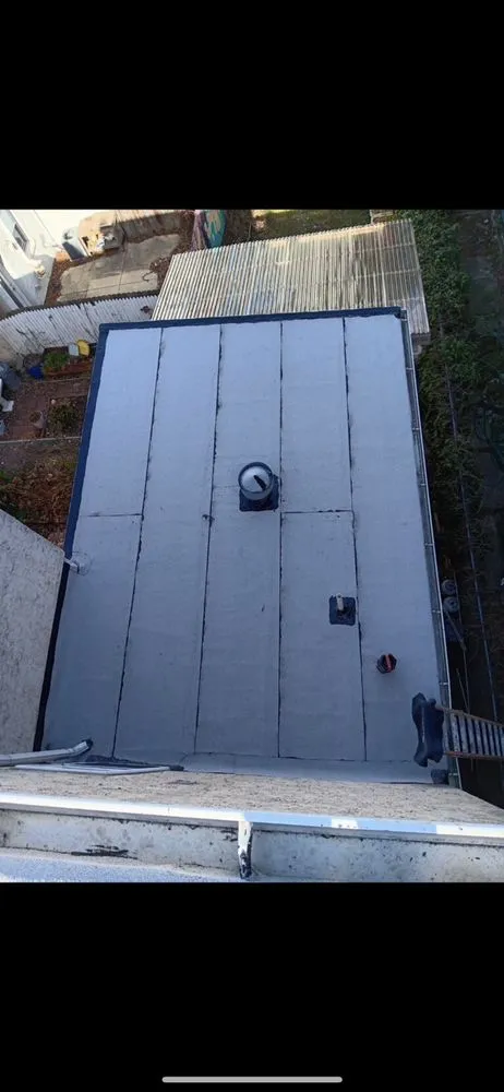 Slide of Malcolm Bros Roofing & Construction