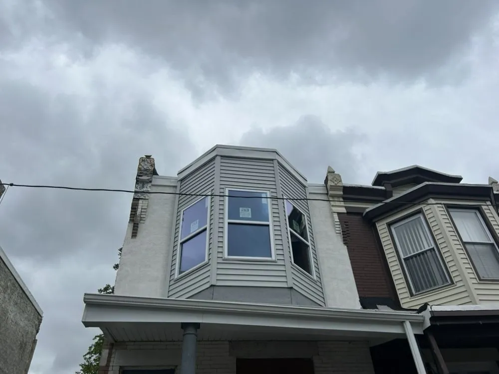 Slide of Malcolm Bros Roofing & Construction