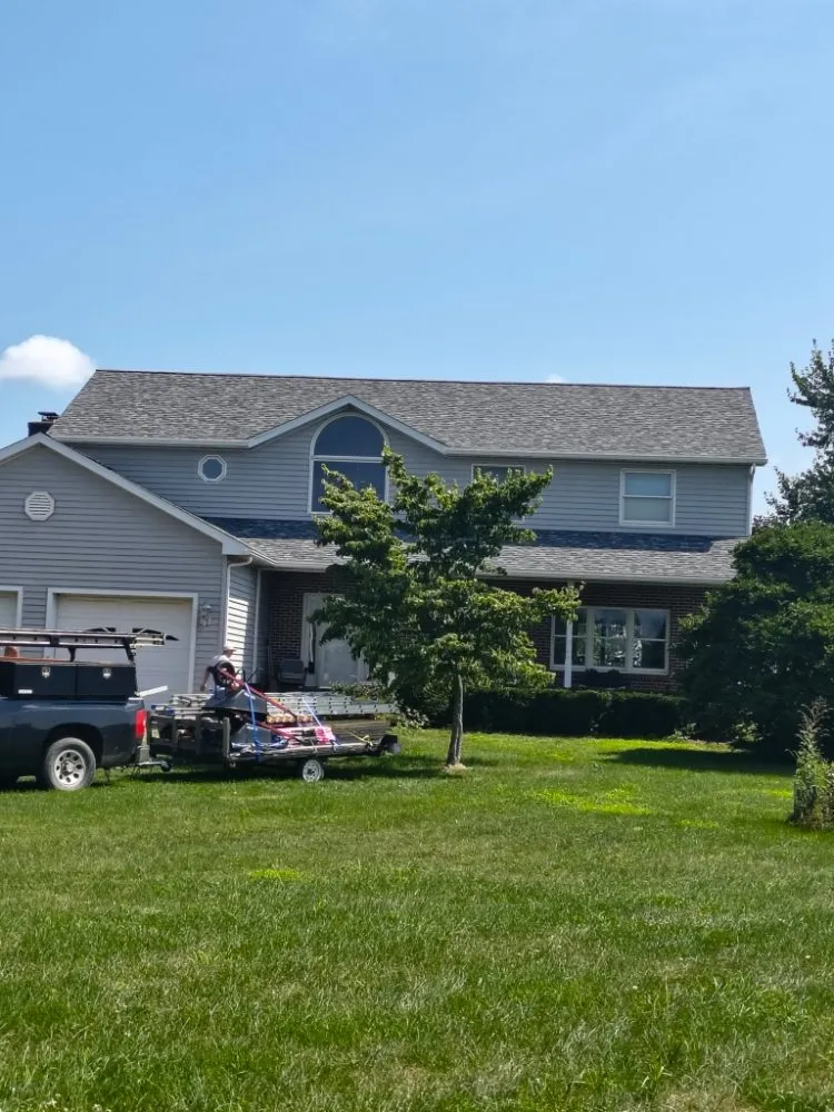 Slide of Malone Roofing