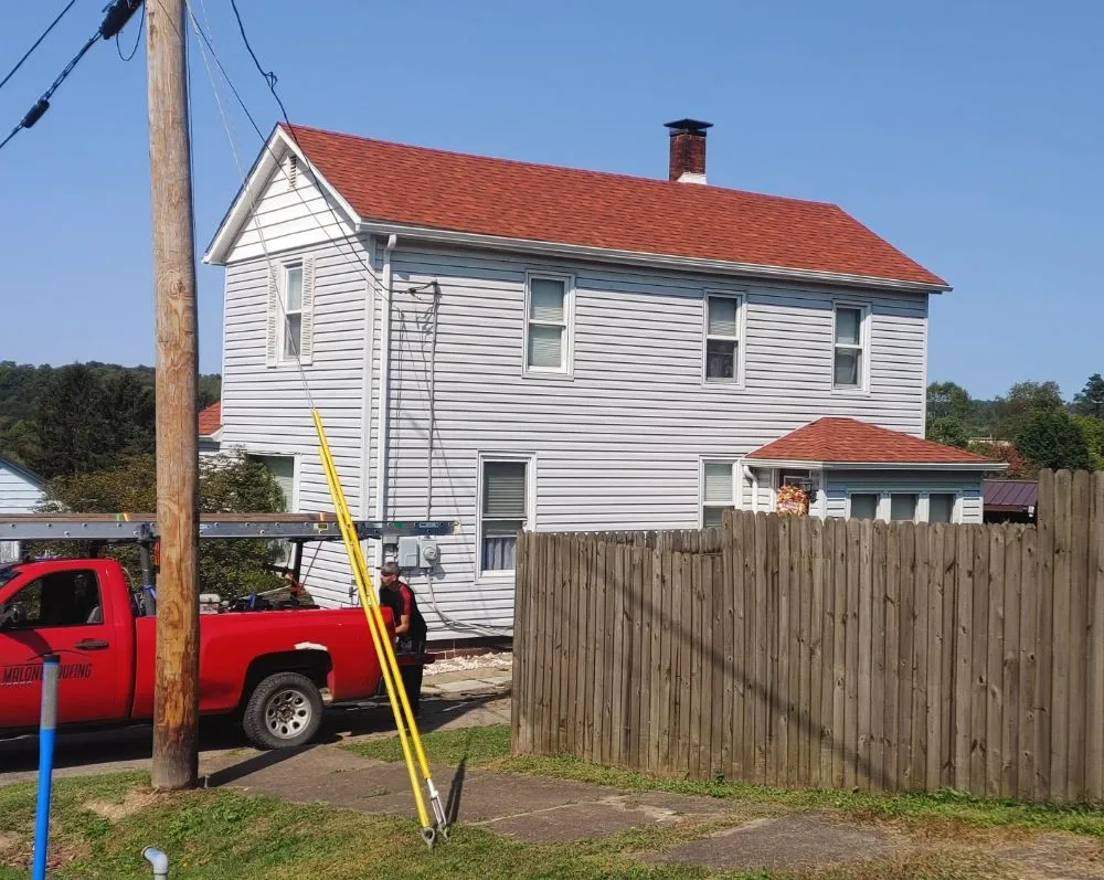 Slide of Malone Roofing